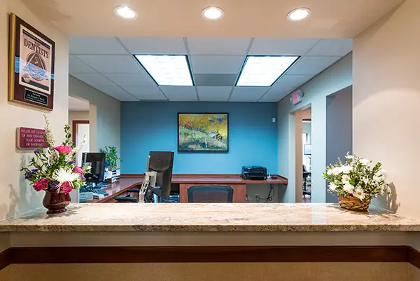 The reception area/front desk at The Strongsville Center for Cosmetic & Implant Dentistry