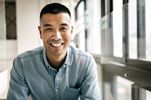 Asian Man Smiling GettyImages 1168469141